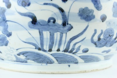Lot 173 - A large Chinese blue and white fish bowl, 20th...