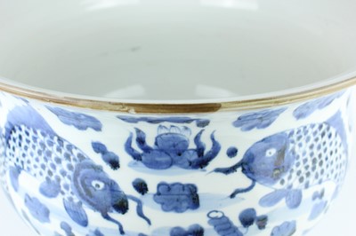 Lot 173 - A large Chinese blue and white fish bowl, 20th...