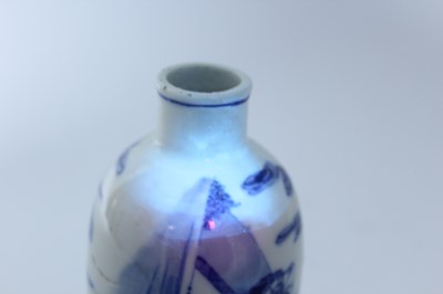 Lot 6 - A small Chinese blue and white bottle vase,...