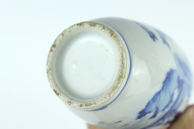 Lot 6 - A small Chinese blue and white bottle vase,...