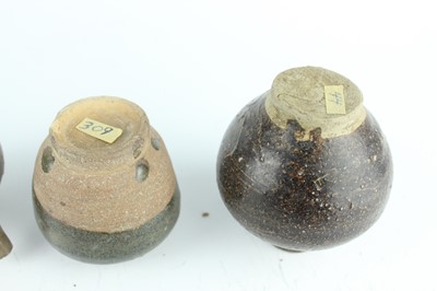 Lot 121 - Five small Chinese black-glazed stoneware pots,...