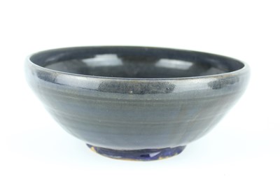 Lot 120 - Three Chinese dark blue to brown glazed...