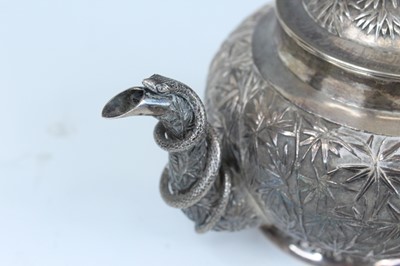 Lot 159 - A set of four Chinese export silver tea sets,...