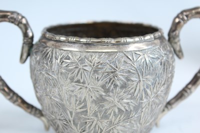 Lot 159 - A set of four Chinese export silver tea sets,...