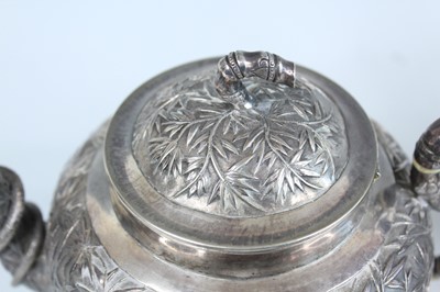 Lot 159 - A set of four Chinese export silver tea sets,...