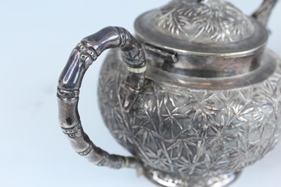 Lot 159 - A set of four Chinese export silver tea sets,...
