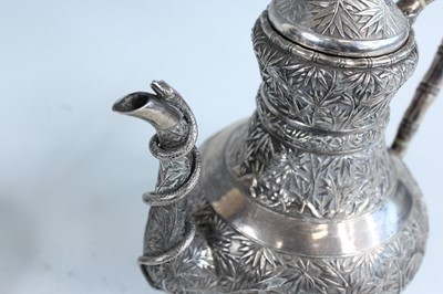 Lot 159 - A set of four Chinese export silver tea sets,...