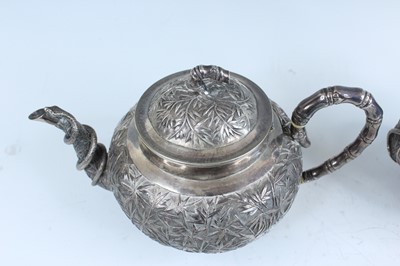 Lot 159 - A set of four Chinese export silver tea sets,...