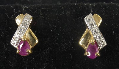 Lot 2610 - A pair of modern 9ct gold, ruby and diamond...