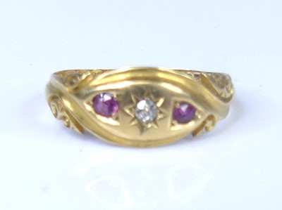 Lot 2612 - An Edwardian 18ct gold, ruby and diamond three-...