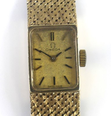 Lot 2622 - A lady's Omega 9ct gold cased bracelet watch,...