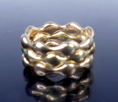Lot 2773 - A Pandora 18ct gold 'Trio' wavy band ring,...