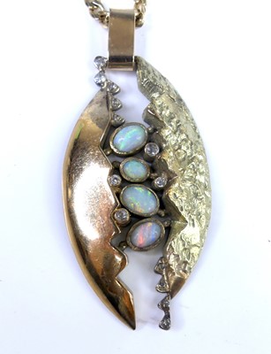 Lot 2796 - A modern 9ct gold, opal and diamond set...