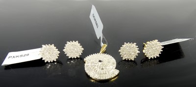 Lot 2624 - A modern Indian 10ct gold and diamond set...