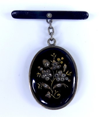 Lot 2626 - A late 19th century white metal, black enamel...