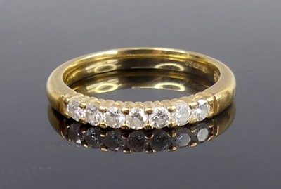 Lot 2780 - A contemporary 18ct gold diamond set half...