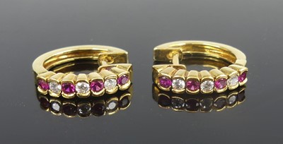 Lot 2806 - A pair of 18ct yellow gold, ruby and diamond...