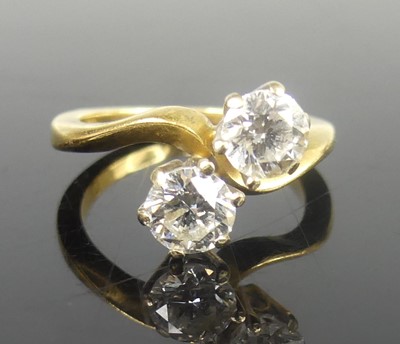 Lot 2818 - A yellow and white metal diamond two-stone...