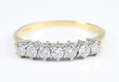 Lot 2819 - An 18ct yellow and white gold diamond...