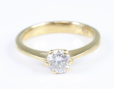 Lot 2808 - A yellow metal diamond solitaire ring, the six-...