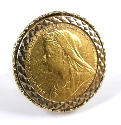 Lot 2833 - A 9ct gold sovereign ring, containing a...