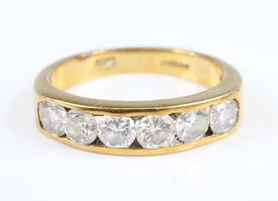 Lot 2824 - An 18ct yellow gold diamond half-hoop ring,...