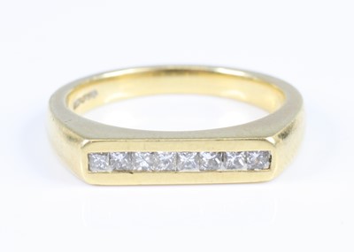 Lot 2838 - An 18ct yellow gold diamond half-hoop ring,...