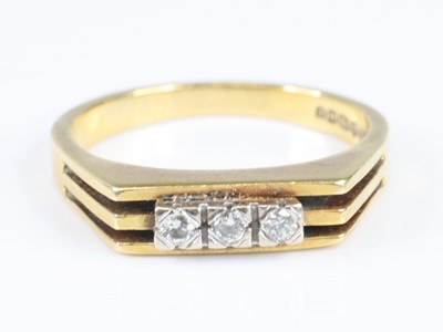 Lot 2839 - An 18ct gold and platinum diamond three-stone...