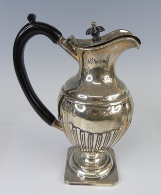 Lot 2243 - A late Victorian silver pedestal hot water pot,...