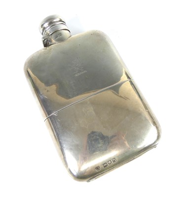 Lot 878 - An Edwardian silver hip flask, with engraved...