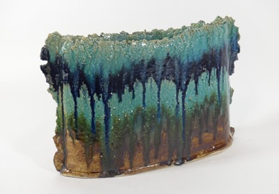 Lot 43 - A ceramic planter, of round rectangular form,...