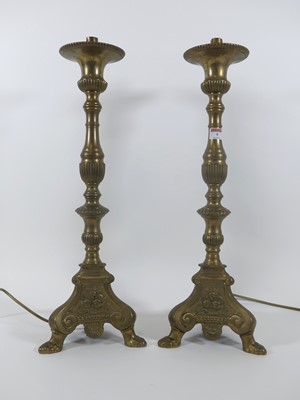 Lot 9 - A pair of brass table lamps in the French...