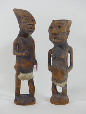 Lot 18 - A pair of African carved softwood fertility...