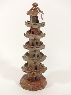 Lot 24 - A Chinese carved hardstone model of a pagoda...