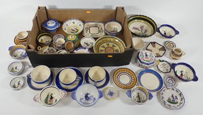 Lot 61 - A collection of Quimper faience pottery, to...