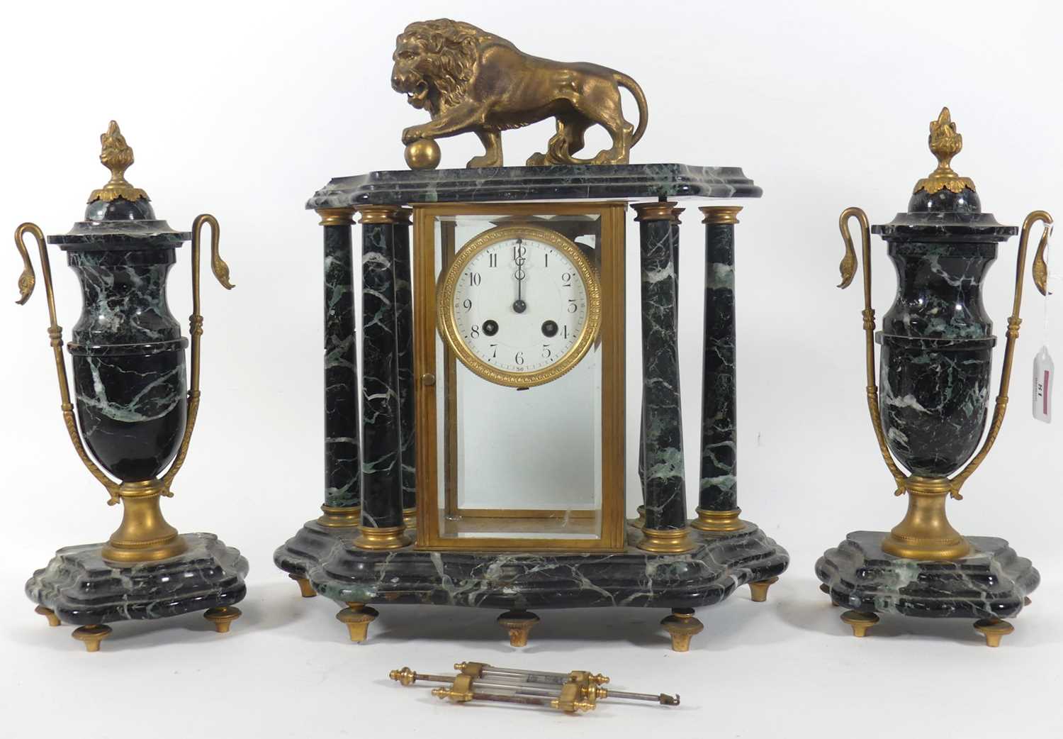 Lot 48 - A 19th century French three-piece marble clock...