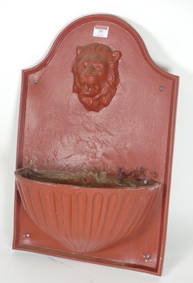 Lot 77 - A red painted lead garden water feature,...