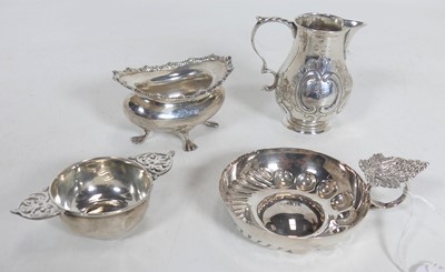 Lot 192 - A modern silver wine taster of circular form,...