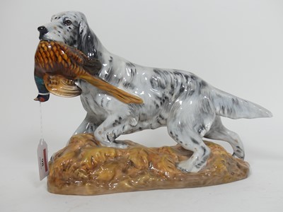 Lot 98 - A Royal Doulton pottery figure of an English...