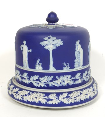 Lot 104 - A dark blue jasperware cheese dome on stand,...