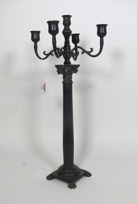 Lot 110 - A reproduction bronzed metal five-branch table...