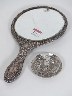 Lot 222 - A sterling silver ring stand in the form of a...