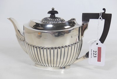 Lot 223 - A George V silver bachelors teapot, of...