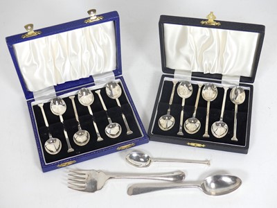 Lot 231 - A set of six modern silver coffee spoons, in...