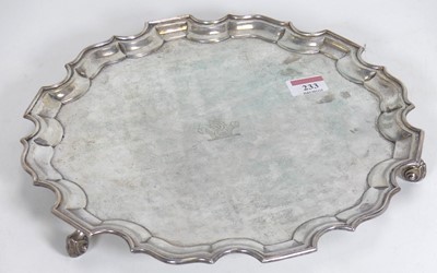 Lot 233 - An Edwardian silver salver, of shaped circular...