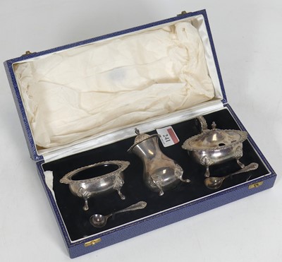 Lot 241 - A mid-20th century silver three-piece cruet...