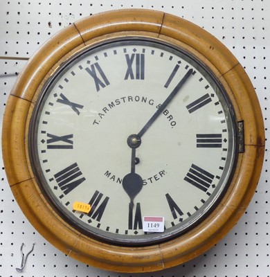 Lot 1149 - A late Victorian oak circular wall clock, the...