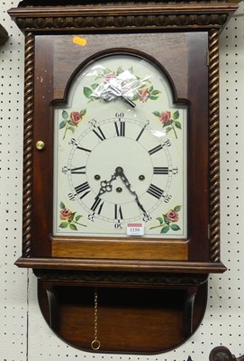 Lot 1150 - A mahogany wall clock, having an arched...