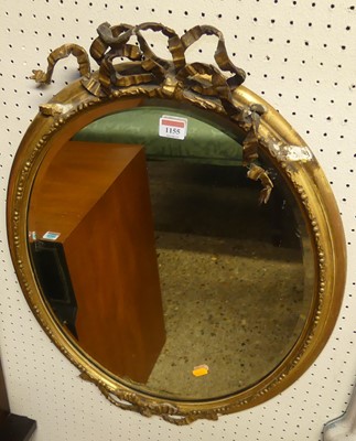 Lot 1155 - A 19th century giltwood and gesso framed oval...
