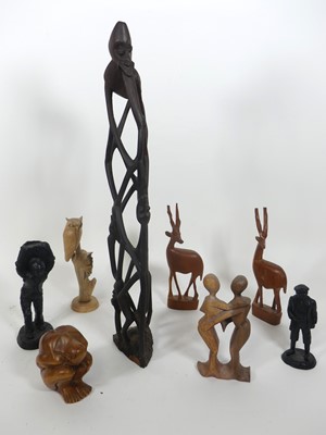 Lot 131 - An African carved hardwood figure group, of...